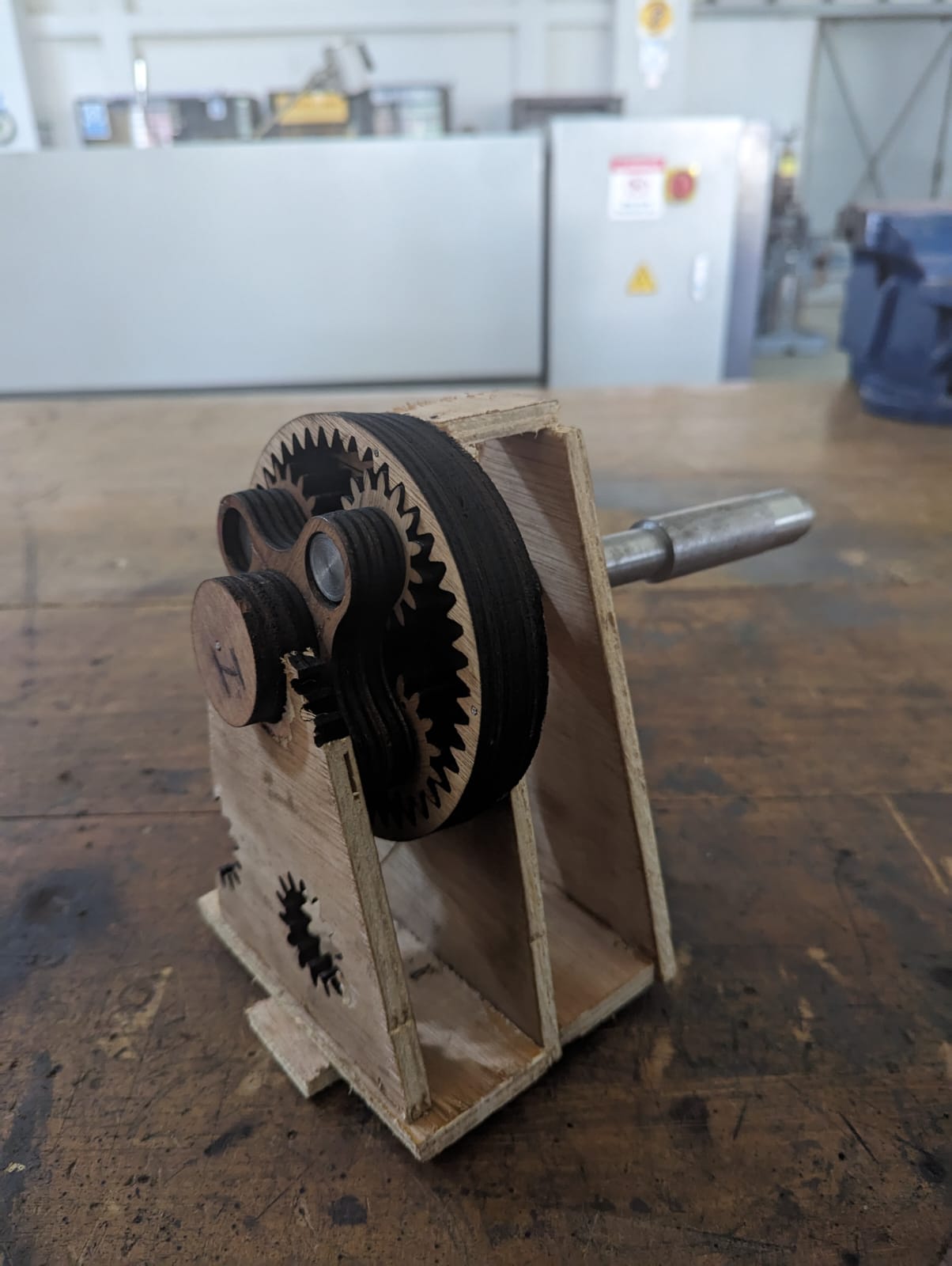 Wooden planetary gear mechanism fabricated and assembled as a MIST team project